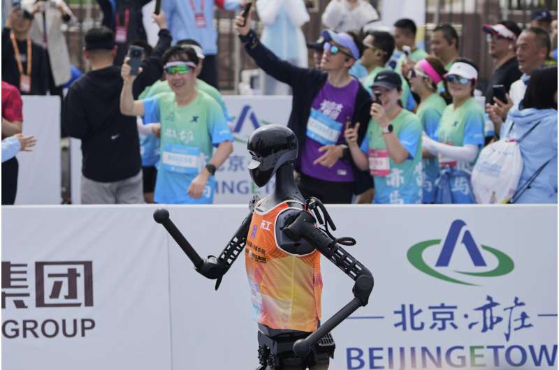 Humanoid robots run a Chinese half-marathon alongside flesh-and-blood competitors