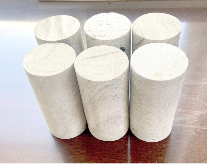Experimental-simulation analysis on mechanical degradation and energy evolution characteristics of sandstone under water-rock coupling effects