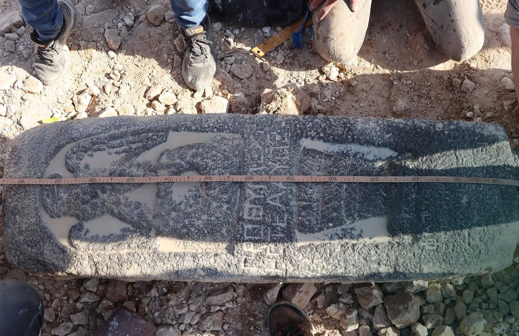 Stele discovered with a carved eagle and Greek inscription 