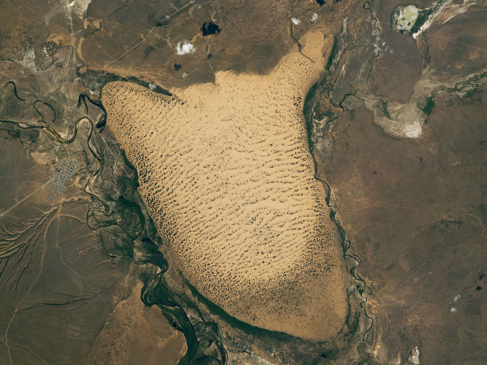 Giant sandy ‘slug’ crawls through floodplains in Kazakhstan, but it could soon be frozen in place — Earth from space