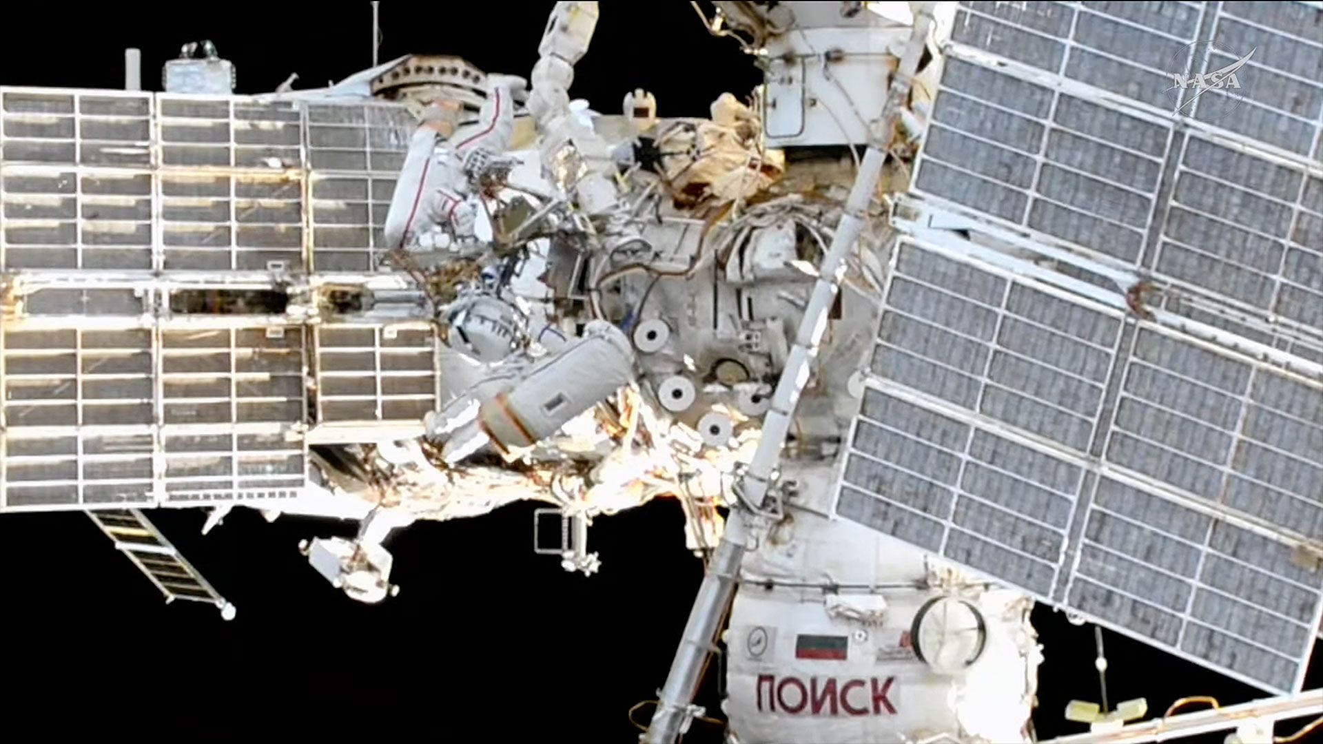 Russian cosmonauts install semiconductor experiment, jettison old HDTV camera during spacewalk outside ISS