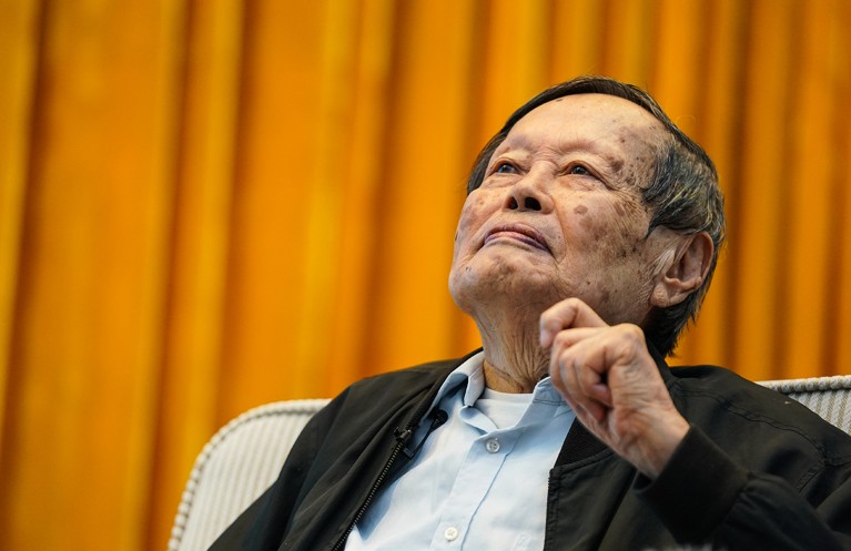 intuitive physicist whose theories on broken symmetries were proved right