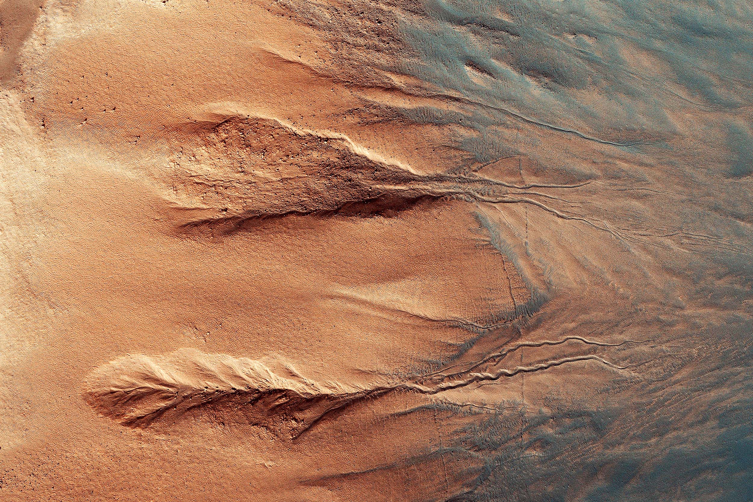 Mars is covered with gullies, but no one is sure what created them