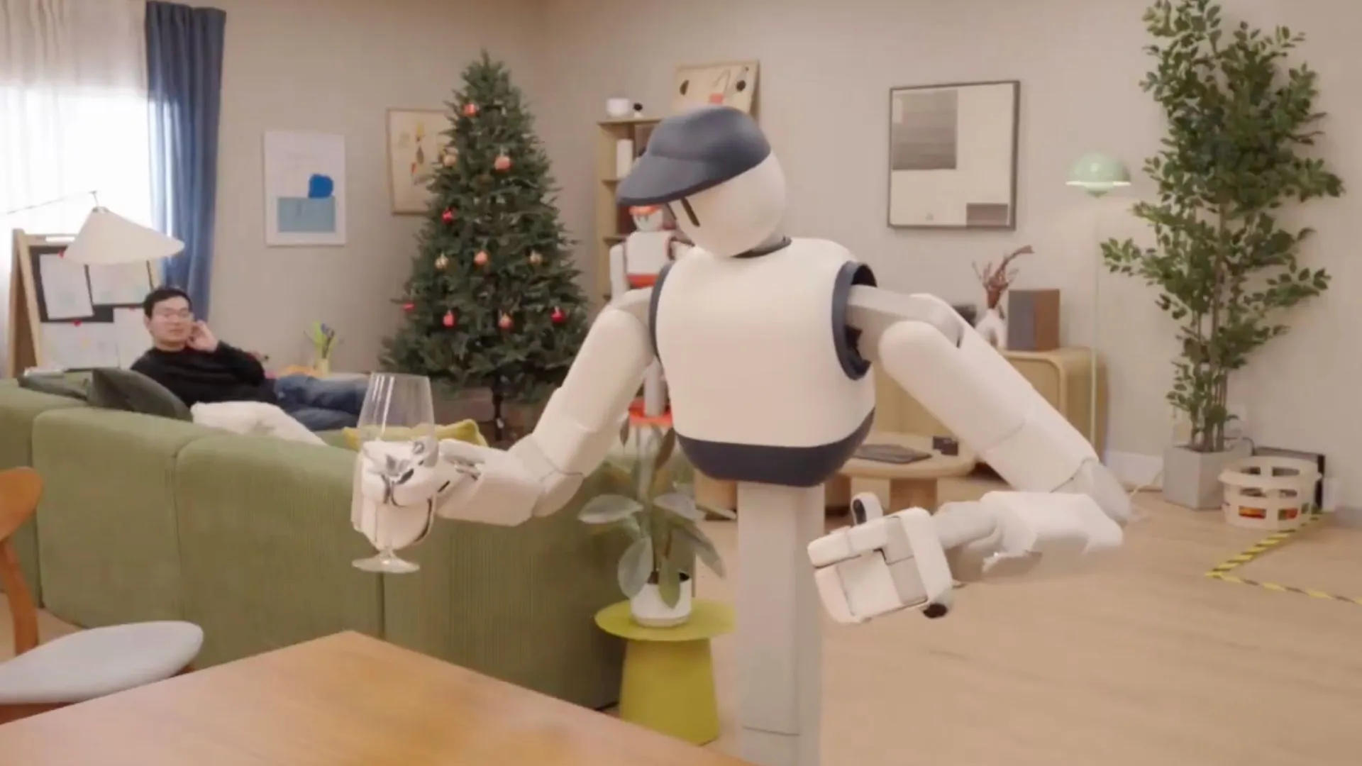 US household humanoid robot learns kitchen chores by watching humans