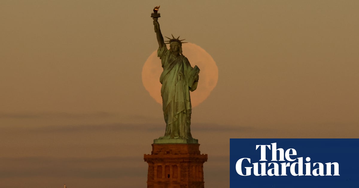 Wolf supermoon across the world – in pictures – The Guardian