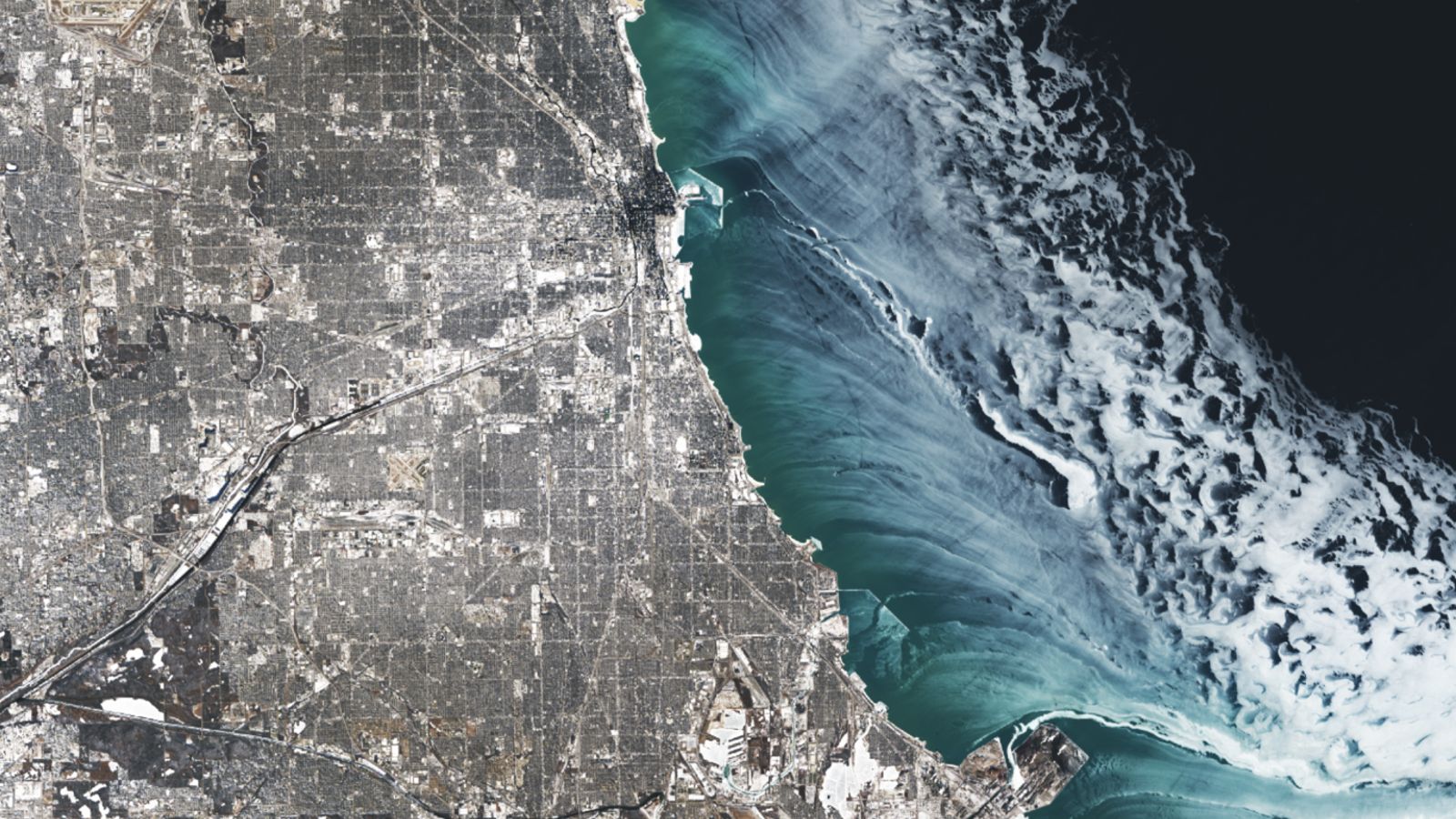 Ethereal ice structures swirl alongside Chicago during extreme cold snap fueled by polar vortex — Earth from space