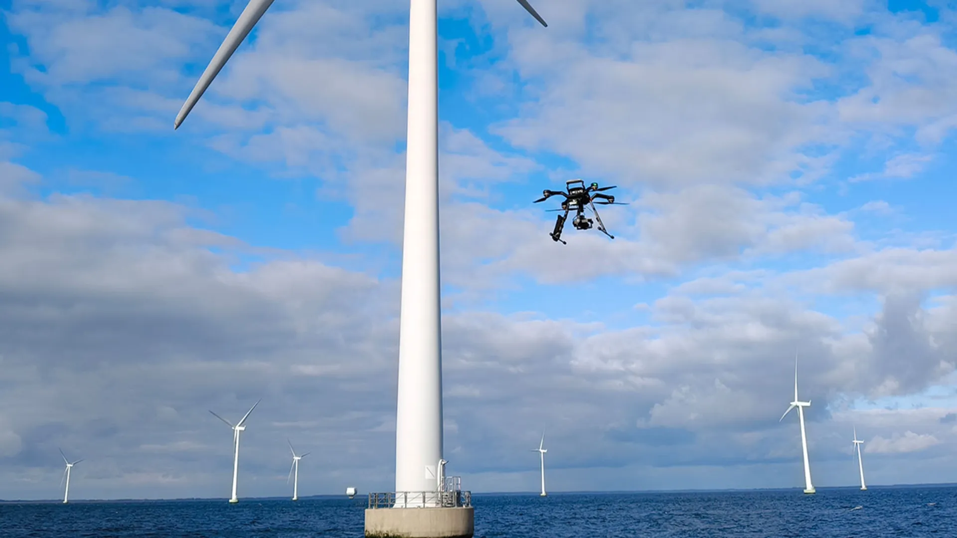 Drones inspect offshore wind turbines while spinning
