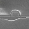 Atomic layer processing for silicon carbide-based quantum photonic circuits