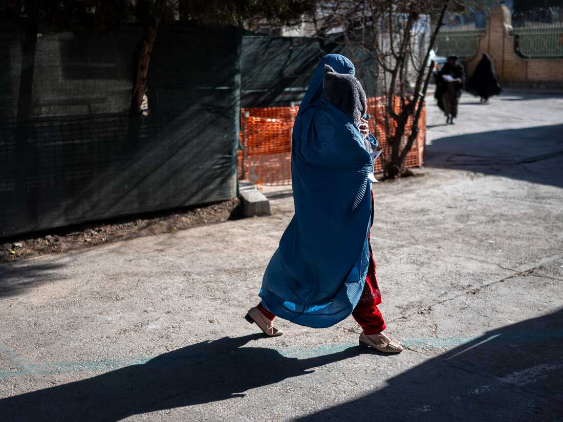 Taliban cracks down on women who don’t cover up in public : NPR