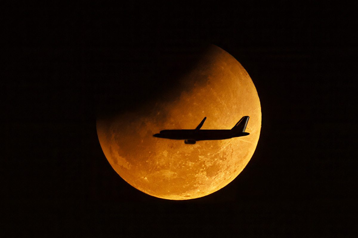 In pictures – the blood Moon lunar eclipse wows observers across North America, Asia and Australia