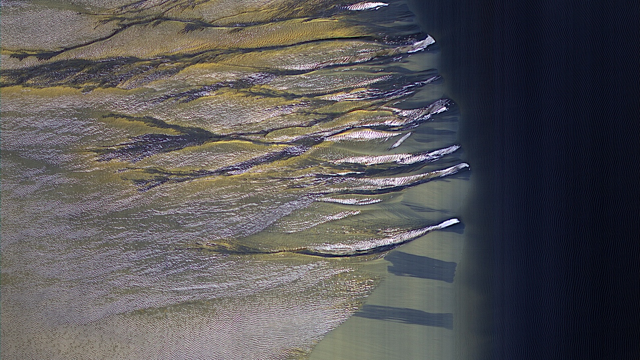 Defrosting Dunes in Kaiser Crater On Mars