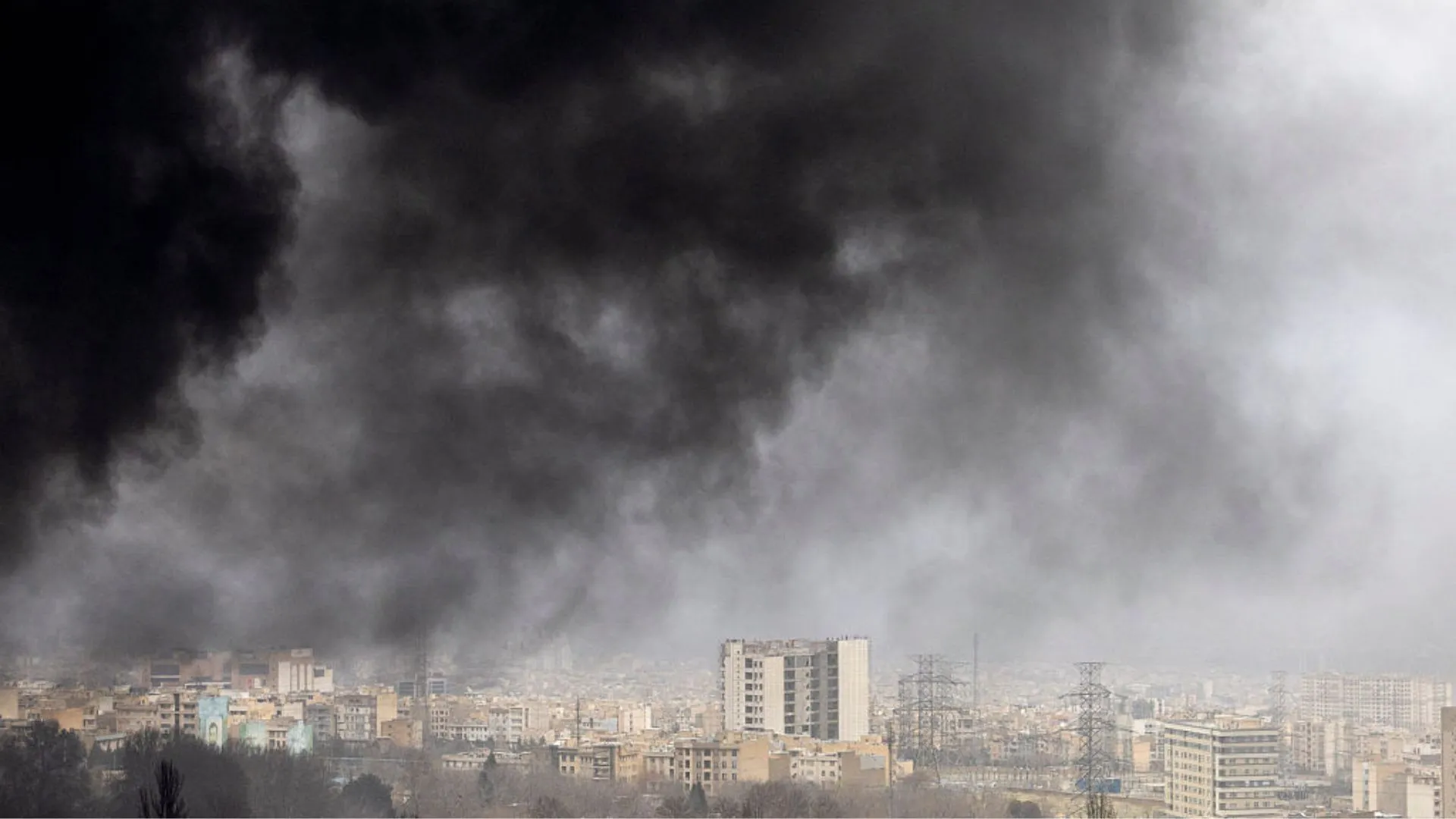 Tehran hit by ‘black rain’ after US-Israeli strikes on oil depots