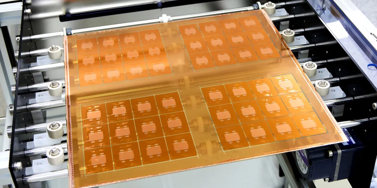 The Download: AI chips built on glass, and a universal “AI-free” logo