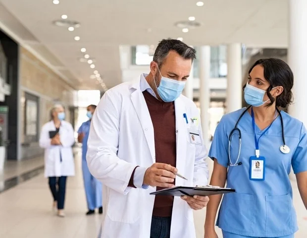 Post amputation pain differs with movement and prosthetic type