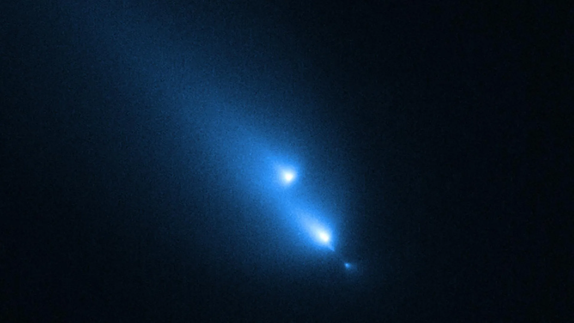NASA’s Hubble accidentally caught a comet breaking apart in real time