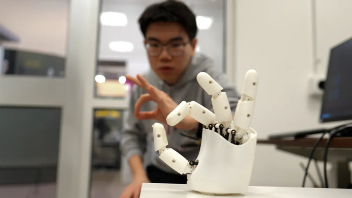This wristband makes you a robot puppeteer