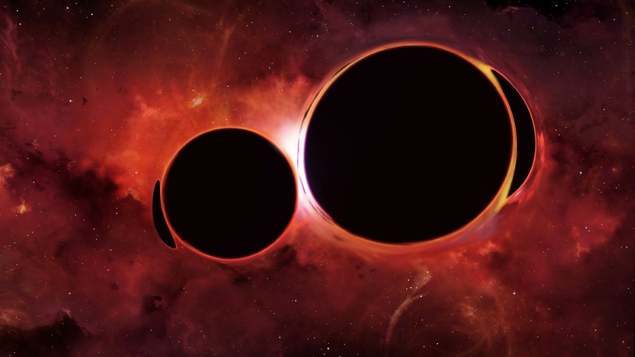 Astronomers spotted a pair of monster black holes that could collide in just 100 years — and Earth will feel it