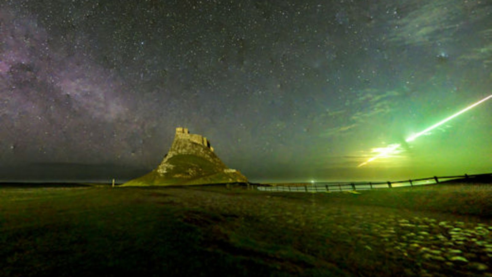 Bright-green fireball meteor spotted exploding above Lindisfarne Castle, famous Viking raid site in UK
